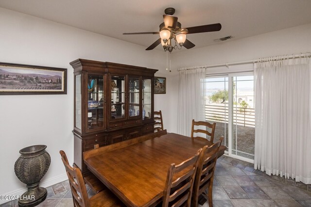 dining room featuring ceiling fan