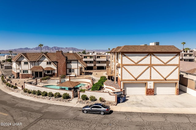 exterior space featuring a mountain view and a residential view