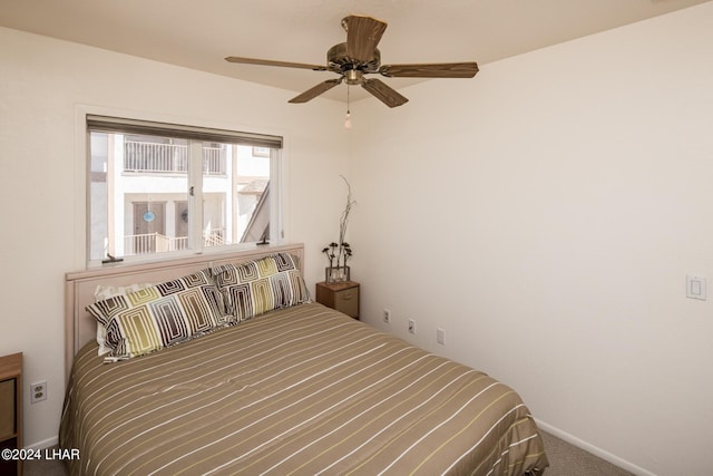 bedroom featuring baseboards, a ceiling fan, and carpet floors