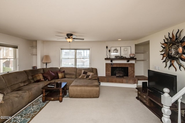 dining space with visible vents, ceiling fan with notable chandelier, carpet flooring, and stairs