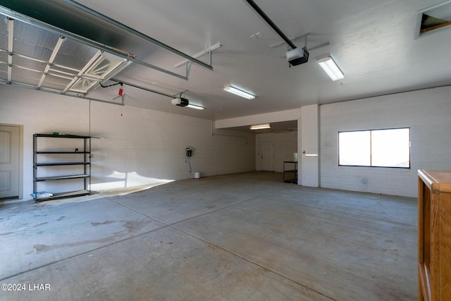 garage featuring a garage door opener