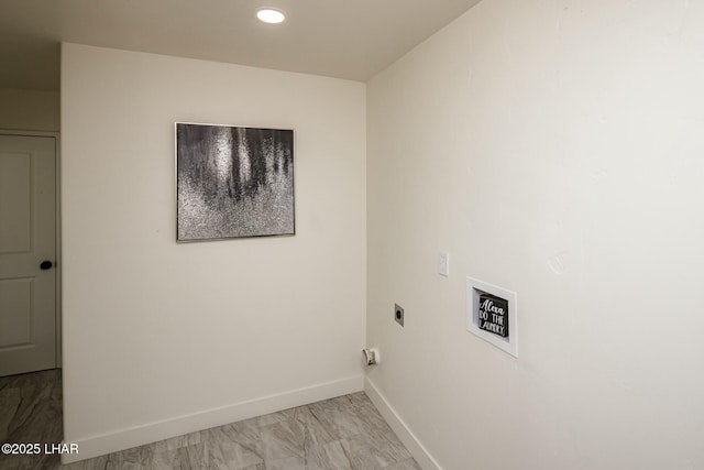 clothes washing area featuring laundry area, hookup for an electric dryer, marble finish floor, and baseboards