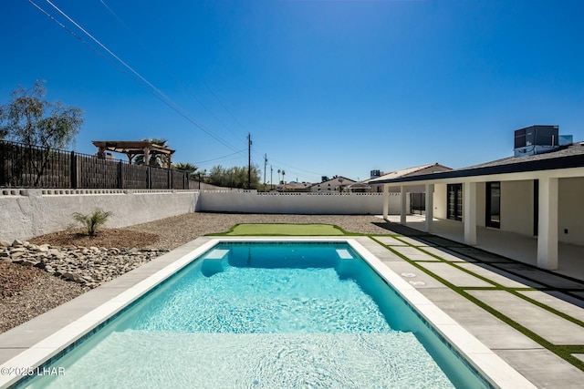 view of swimming pool with a patio, central AC unit, a fenced backyard, and a fenced in pool