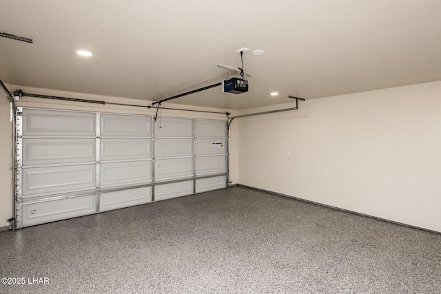 garage featuring recessed lighting, baseboards, and a garage door opener