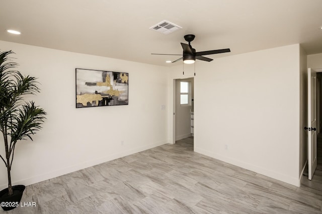 unfurnished room with baseboards, visible vents, a ceiling fan, and recessed lighting