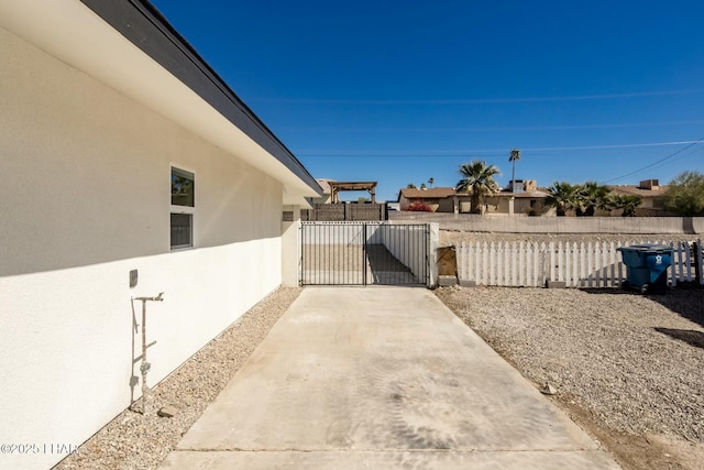 view of yard featuring a gate and fence