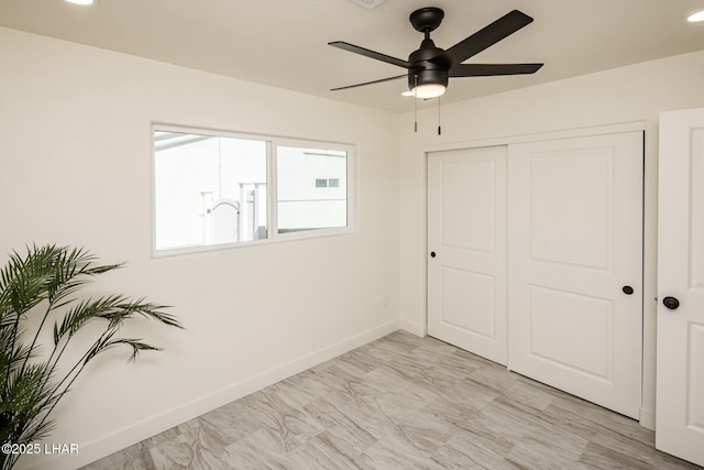 unfurnished bedroom featuring a closet, recessed lighting, visible vents, and baseboards