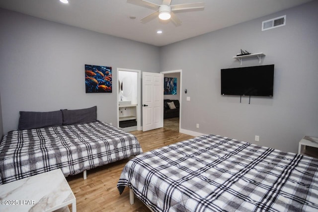 bedroom featuring visible vents, baseboards, recessed lighting, ceiling fan, and light wood-style floors