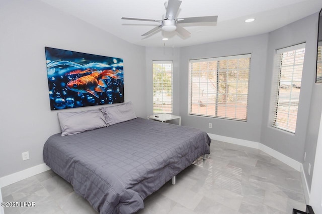 bedroom with recessed lighting, a ceiling fan, and baseboards