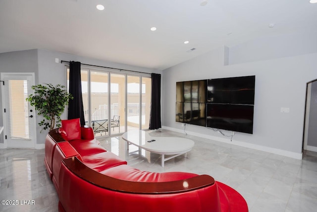 living area featuring recessed lighting, baseboards, and vaulted ceiling