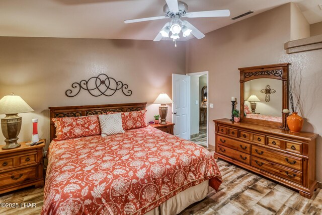 bedroom featuring ceiling fan and light hardwood / wood-style floors