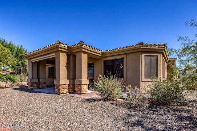 exterior space with a patio area