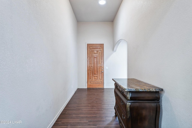 2555 Avalon Ln, Lake Havasu City, AZ 86404 - corridor with dark wood-type flooring, baseboards, and arched walkways