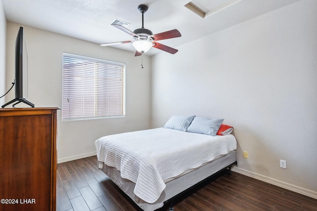 2555 Avalon Ln, Lake Havasu City, AZ 86404 - bedroom with baseboards, wood finished floors, and attic access