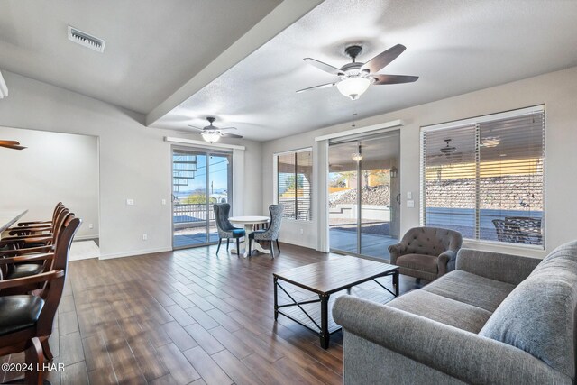 2555 Avalon Ln, Lake Havasu City, AZ 86404 - living room featuring ceiling fan, baseboards, and dark wood-style floors