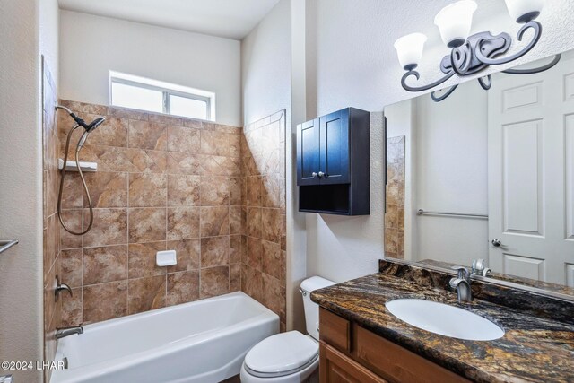 2555 Avalon Ln, Lake Havasu City, AZ 86404 - bathroom with toilet, bathing tub / shower combination, vanity, and a textured wall