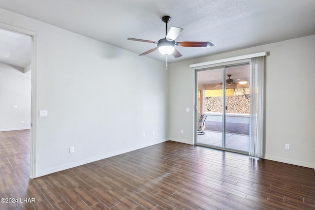 2555 Avalon Ln, Lake Havasu City, AZ 86404 - spare room with ceiling fan, dark wood finished floors, and baseboards