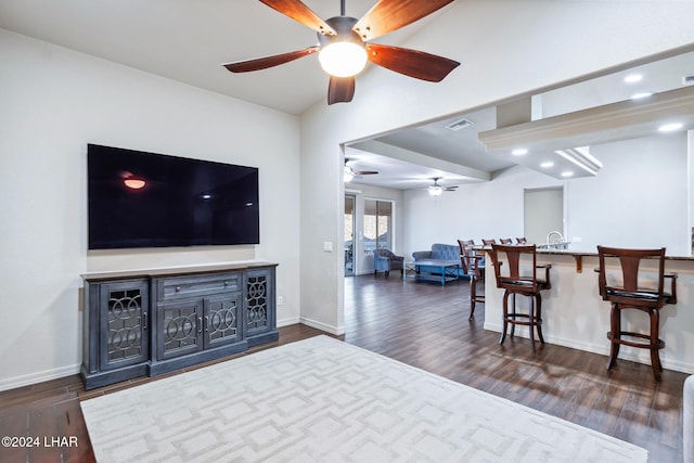 2555 Avalon Ln, Lake Havasu City, AZ 86404 - living area with a ceiling fan, dark wood-style flooring, and baseboards