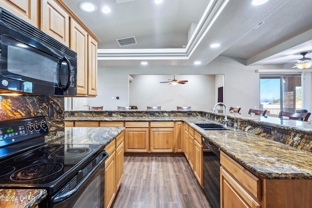 2555 Avalon Ln, Lake Havasu City, AZ 86404 - kitchen featuring black appliances, a ceiling fan, a sink, recessed lighting, and a tray ceiling