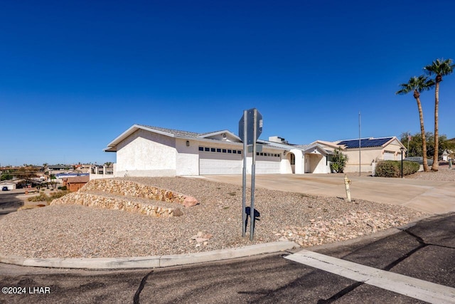 view of front of home with a garage