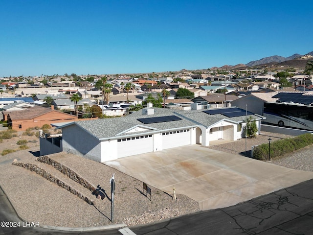 drone / aerial view with a mountain view