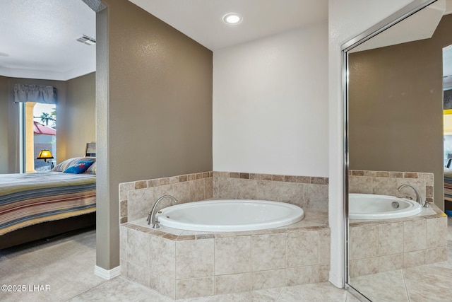 ensuite bathroom featuring a bath, ensuite bath, tile patterned flooring, visible vents, and recessed lighting