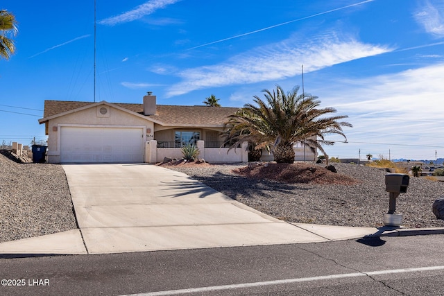 ranch-style home featuring a garage