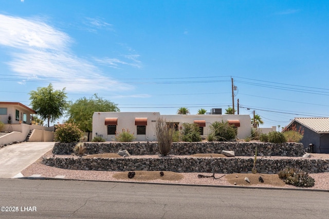 view of adobe home