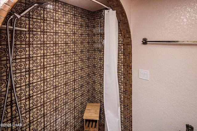 bathroom with a shower with curtain