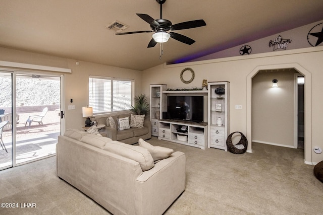 carpeted living room featuring lofted ceiling and ceiling fan