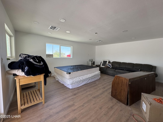 31567 94th St, Parker, AZ 85344 - playroom featuring wood finished floors, baseboards, and recessed lighting