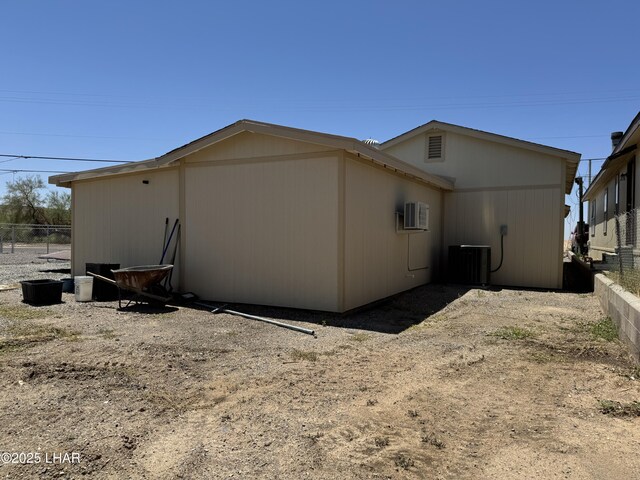 31567 94th St, Parker, AZ 85344 - back of house with central air condition unit