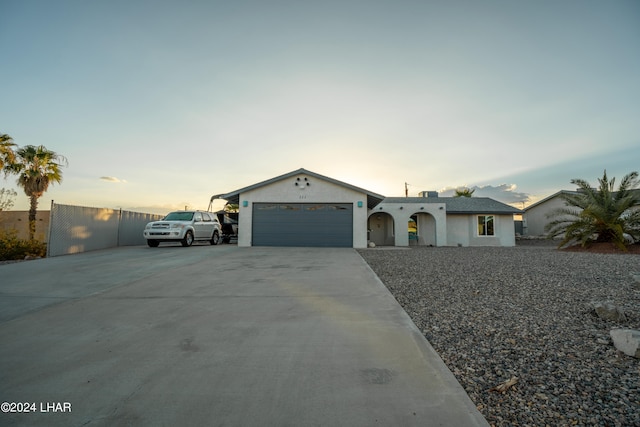 ranch-style home with a garage