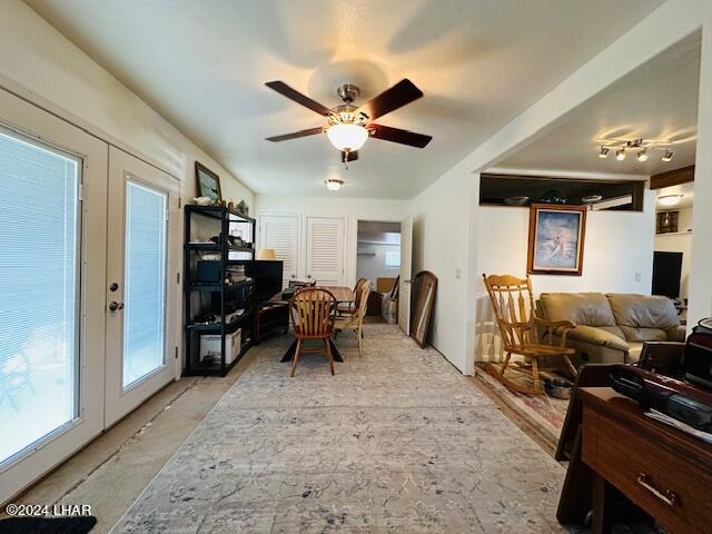 office space with french doors and ceiling fan