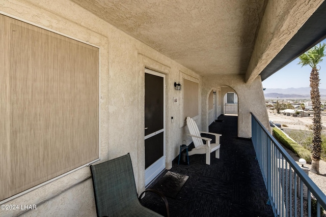 balcony featuring a mountain view