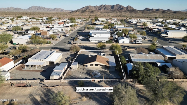 drone / aerial view with a residential view and a mountain view