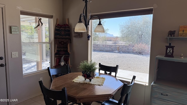 dining area with light tile patterned floors