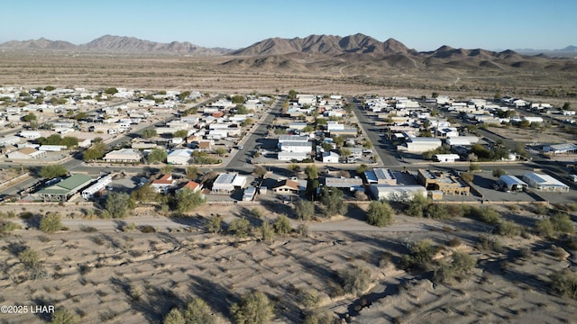 drone / aerial view featuring a residential view and a mountain view