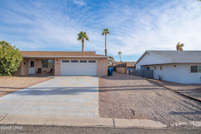 single story home featuring a garage