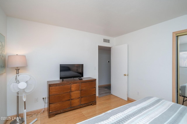 bedroom with light hardwood / wood-style floors