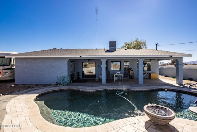 view of pool featuring a patio