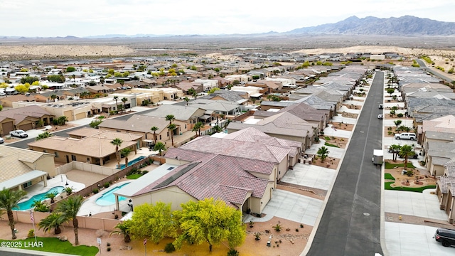 drone / aerial view with a mountain view and a residential view