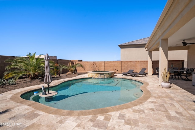 view of swimming pool with a ceiling fan, a patio area, outdoor dining area, a fenced backyard, and a pool with connected hot tub