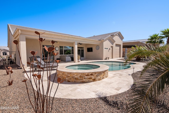 outdoor pool with a patio area, an in ground hot tub, fence, and ceiling fan