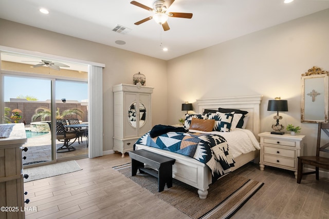 bedroom with access to outside, a ceiling fan, visible vents, recessed lighting, and wood finished floors