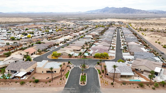 drone / aerial view with a mountain view and a residential view