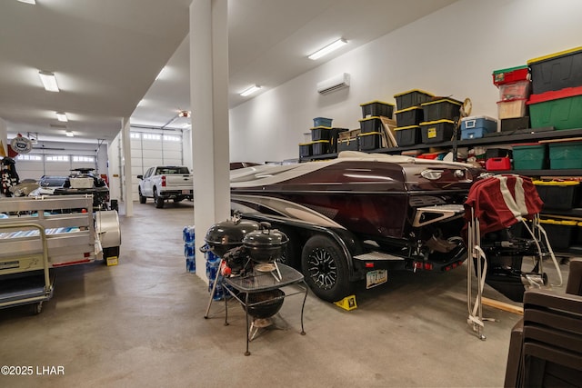 garage with a wall mounted air conditioner