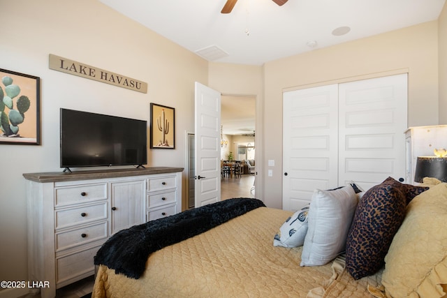bedroom with a closet and a ceiling fan