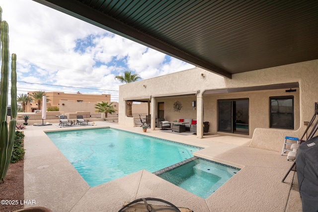 view of swimming pool with a patio area, a fenced backyard, a pool with connected hot tub, and an outdoor living space