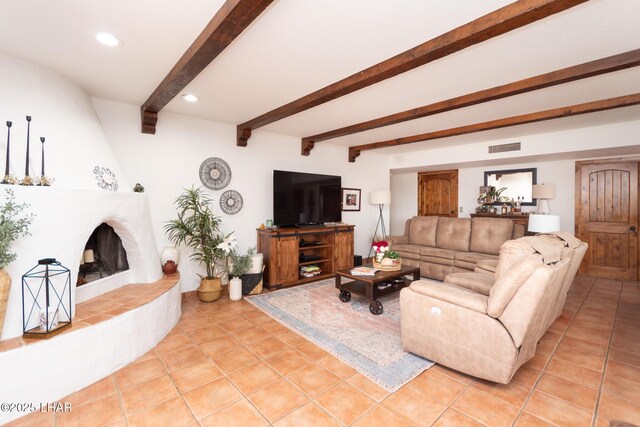 living room featuring beam ceiling, a notable chandelier, baseboards, and light tile patterned floors